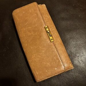 Fossil brown clutch wallet with key detailing preloved condition